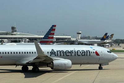 American Airlines Wing Clips United Plane's Tail At O'Hare