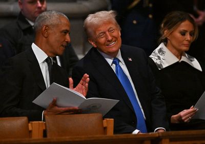 Donald Trump and Barack Obama share laugh as presidents unite for Jimmy Carter’s funeral