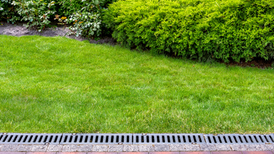 French drains vs trench drains – experts explain the difference, and uncover which is best for your yard