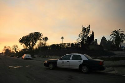 Shotgun Watch: LA Fire Evacuees Guard Against Looters