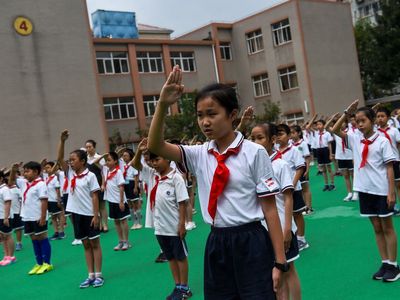 Police clash with protesters in China after student falls to his death