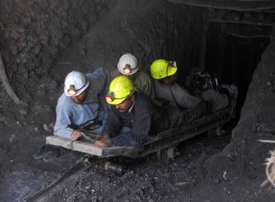 Rescuers race to save 12 workers after gas explosion in Pakistan coal mine