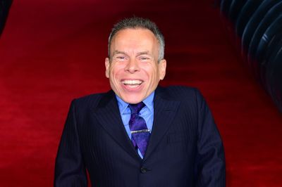 Warwick Davis dedicates Bafta Fellowship award to those who have supported him