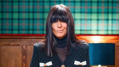 Claudia Winkleman's cutesy bow cardigan and chunky boots is my favourite Traitors outfit so far