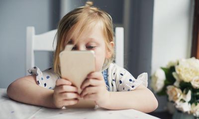 ‘Each year you delay giving a phone is a big win’: child screen-time solutions from around the world