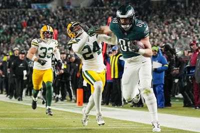 Dallas Goedert delivers a double-stiff arm to Packers Carrington Valentine on 24 yard TD