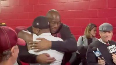 Terry McLaurin, Magic Johnson Embrace After Commanders' First Playoff Win Since 2006