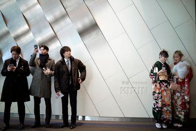 AP Photo Gallery: Young people in Japan mark Coming of Age Day with sumptuous kimonos