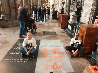 Just Stop Oil activists spray paint Charles Darwin's grave inside Westminster Abbey