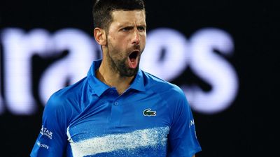 Djokovic overcomes stutter to move into second round at Australian Open