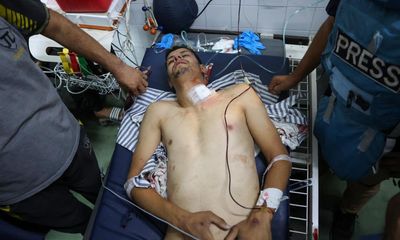 ‘Fadi is fighting for his life’: Israel blocks evacuation of cameraman shot in Gaza