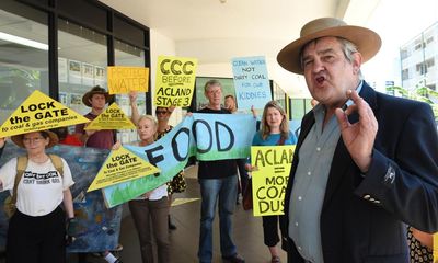 ‘Down but not out’: Queensland farmers end 11-year legal fight against New Acland coalmine expansion