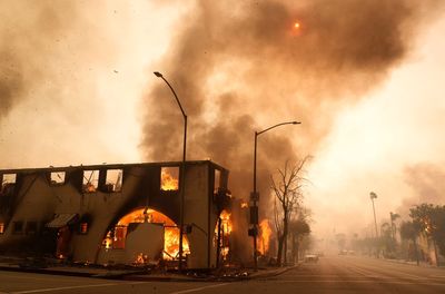 Wildfires latest: Firefighters prepare for dry conditions and strong winds