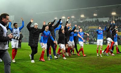 European football: 10-man Holstein Kiel seal win over Dortmund with 45-yarder