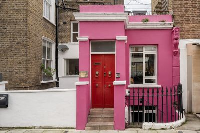 'It's one of the most-photographed houses in Notting Hill': bright pink skinny house for sale for £1.25m