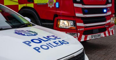 Man dies and woman in hospital after property fire on Glasgow street