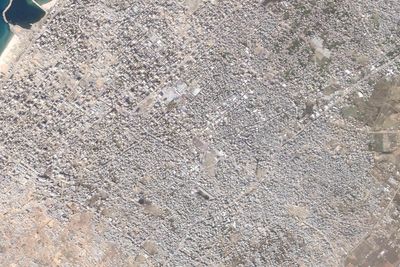 Satellite photos show the Gaza Strip before and after the devastation of the Israel-Hamas war