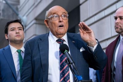 Giuliani says he has settled defamation dispute and will keep Florida condo