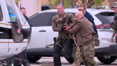 Heartbreaking moment police rush wounded K9 from shootout with a suspect