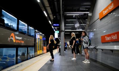 Two injured after tree blown over in Sydney – as it happened