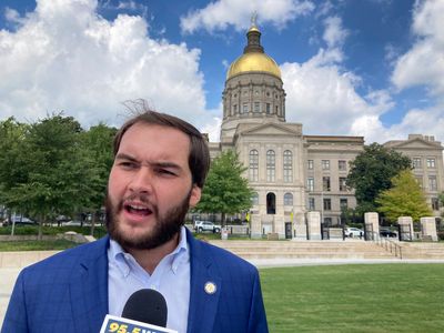 Chaos in Georgia state capitol as Republican lawmaker dragged from chamber during Brian Kemp address