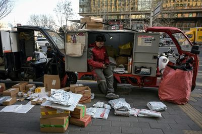 'No Money': Gloom On Beijing Streets As Economic Growth Slows