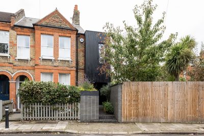 Deceptive skinny house with spacious modern home hidden behind for sale for £850k