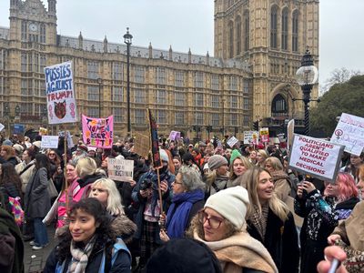 Tens of thousands take to streets across UK to march in solidarity with oppressed women around world