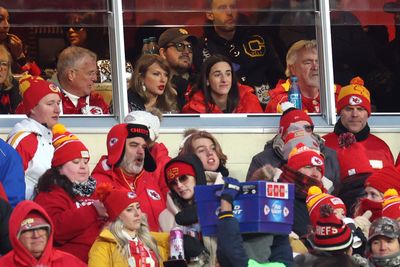 Taylor Swift and Caitlin Clark high fived and hugged while cheering on Travis Kelce