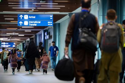 Scores of Afghans have left for the US after their visas were processed in the Philippines