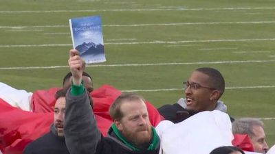 A Flag Carrier at Eagles-Rams Brought Viral A.J. Brown Book Onto Field With Him