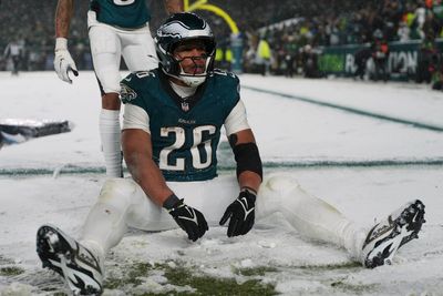 Barkley runs for 78 and 62-yard TDs in the snow and Eagles beat Rams 28-22 to head to NFC title game