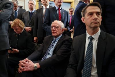 Bernie Sanders sparks another inauguration meme by staying seated during Trump’s standing ovation