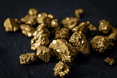 Gold's Momentum Persists: Leading ETF and 2 Stocks to Watch