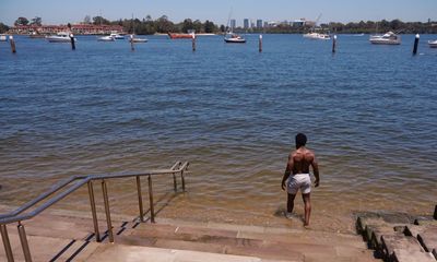 ‘Not as dirty as I thought it would be’: Sydney opens a sandless new beach in the suburbs