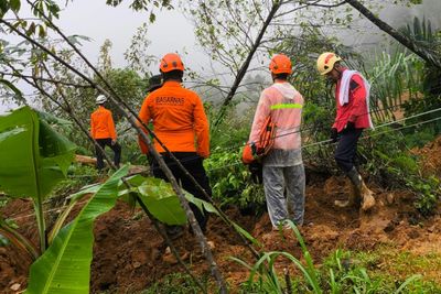 Indonesia Rescuers Search For Survivors As Landslide Kills 19