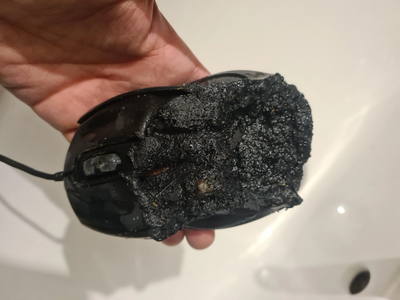 Gigabyte gaming mouse allegedly goes up in flames — scorched device left a hole on user's desk