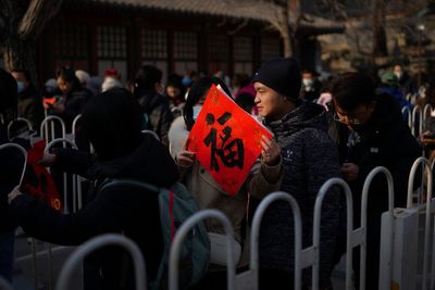 China moves to boost languishing markets by ordering funds to invest more in shares