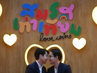 Hundreds of LGBT+ couples wed in Thailand as historic marriage bill comes into effect