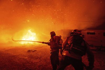 Firefighters battle a huge new fire north of Los Angeles that’s already put 50,000 in evacuation zones