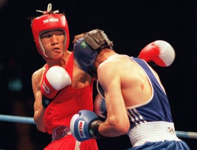 Boxer who was Thailand's first Olympic gold medalist is jailed for sexual assault of a minor