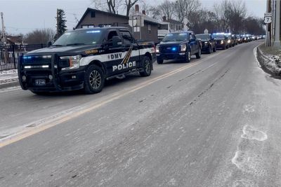 A hearse carrying a fallen U.S. Border Patrol agent has been escorted to a Vermont funeral home