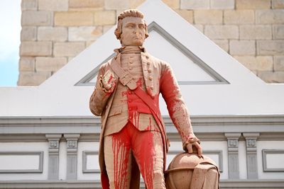 Captain Cook statue disfigured and painted red in Sydney ahead of Australia Day