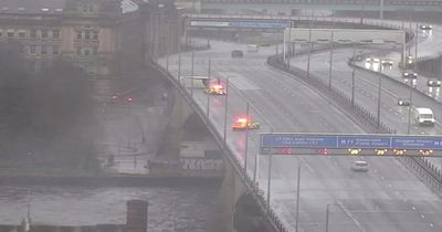 Pictures shows HGV overturned on Glasgow's M8 leaving busy motorway closed