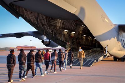 Trump Admin Uses Military Planes For First Deportation Flights As Migrants Are Warned Of 'Severe Consequences'