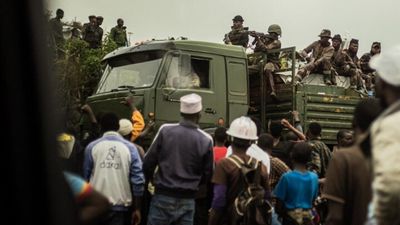 Thousands flee eastern DRC as M23 rebels encircle provincial capital Goma