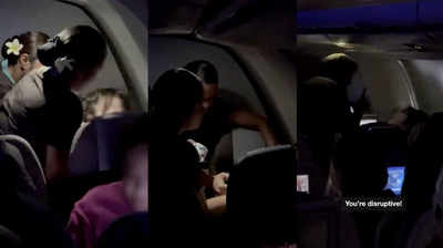 WATCH: Flight Attendants Attempt to Duct Tape 'Intoxicated' Passenger's Mouth Shut After She Made 'Racist and Vulgar' Comments