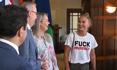 Grace Tame wears anti-Murdoch shirt to PM’s morning tea in snipe at ‘morbidly wealthy oligarchs’