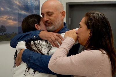 Freed Israeli hostages reunited with families in prisoner swap under Gaza ceasefire deal