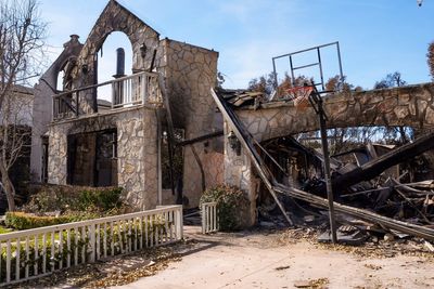 Rain finally falling in Southern California helps firefighters but creates risk of toxic ash runoff